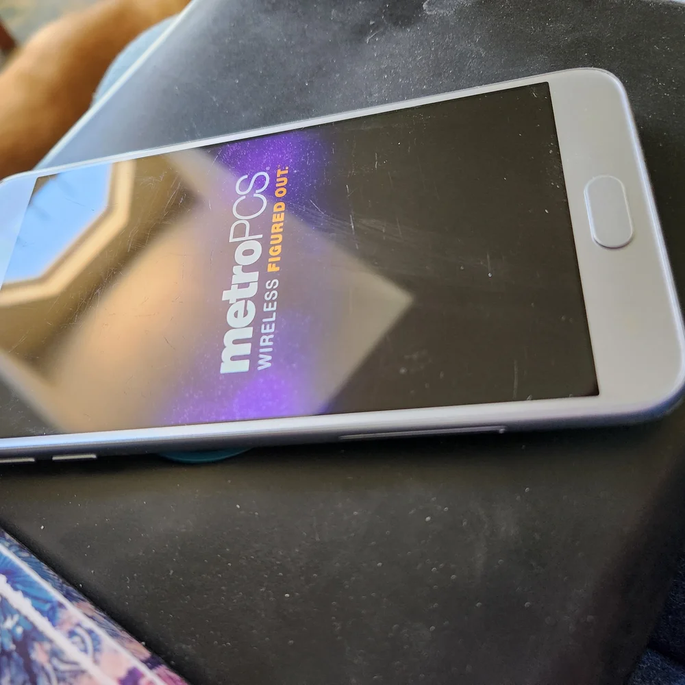 Samsung Silver Smartphone with Black Case